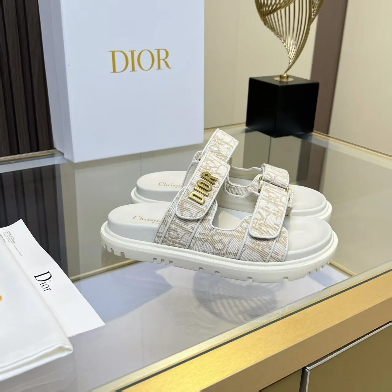 👟👟Ex-factory price 480👟👟 Dior classic popular sandals Step into the fashion territory of Dior slippers and encounter the ultimate fusion of elegance and comfort. The upper is engraved with the Christian Dior Paris logo using exquisite embroidery technology. The delicate stitching tells the brand's profound heritage and is fully recognizable.   Made of high-quality materials, it feels soft and fits your feet, as if it is a gentle care tailor-made for your feet. The sole is carefully designed and engraved with Christian Dior's lucky star symbol. It is not only a beautiful embellishment, but also provides reliable grip, making every step steady and secure.   It has a simple design and is easy to put on and take off. Whether it is a lazy weekend or a pleasant vacation, it can be easily adapted. Whether paired with casual shorts, casual jeans, or an elegant dress, Dior slippers can instantly enhance the overall style and show a casual fashion attitude.   Dior slippers, in the name of fashion, inject luxurious charm into your life and accompany you with every step you take with confidence and elegance. Material: Fine genuine cowhide upper, outsole, TPR, non-slip and wear-resistant, code number: 35-41 (42 customized)